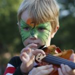 Tune Up Party child with face paint and violin