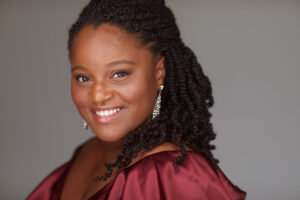 Headshot of Brianna Robinson; she is smiling at the camera. 