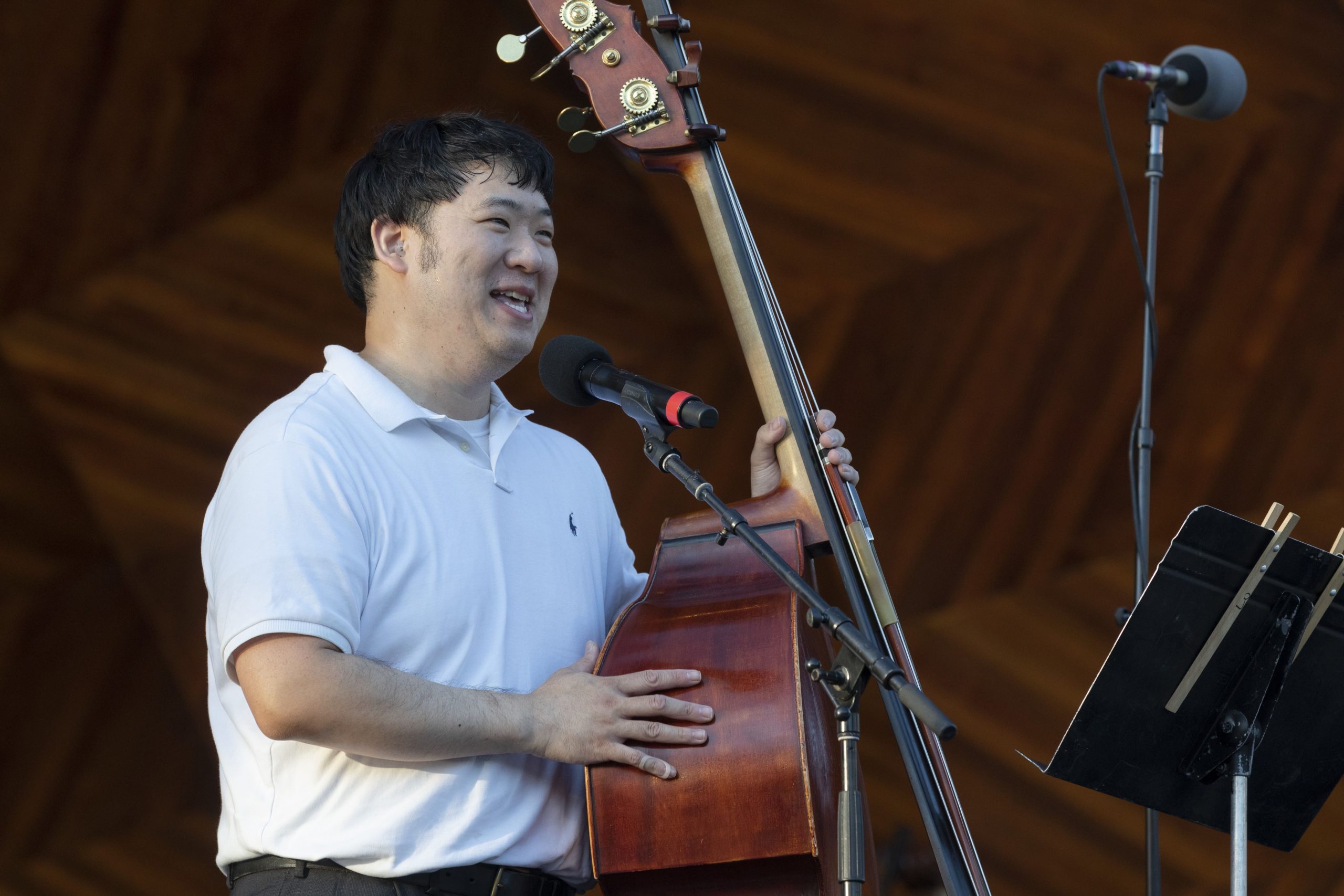 Bebo is onstage at the Hatch Shell, holding his Double Bass.