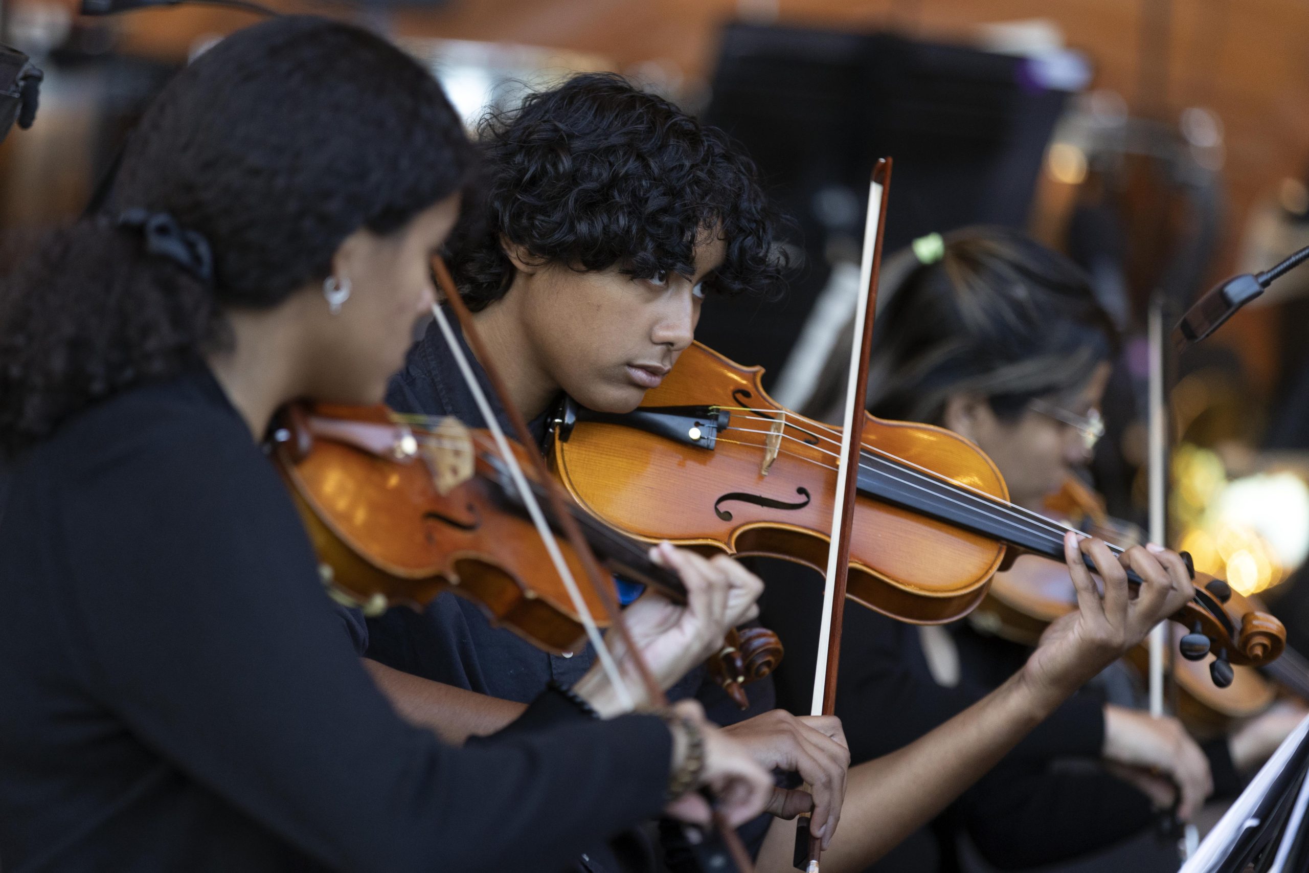 Students of Boston String Academy play their instruments at a Hatch Shell concert.