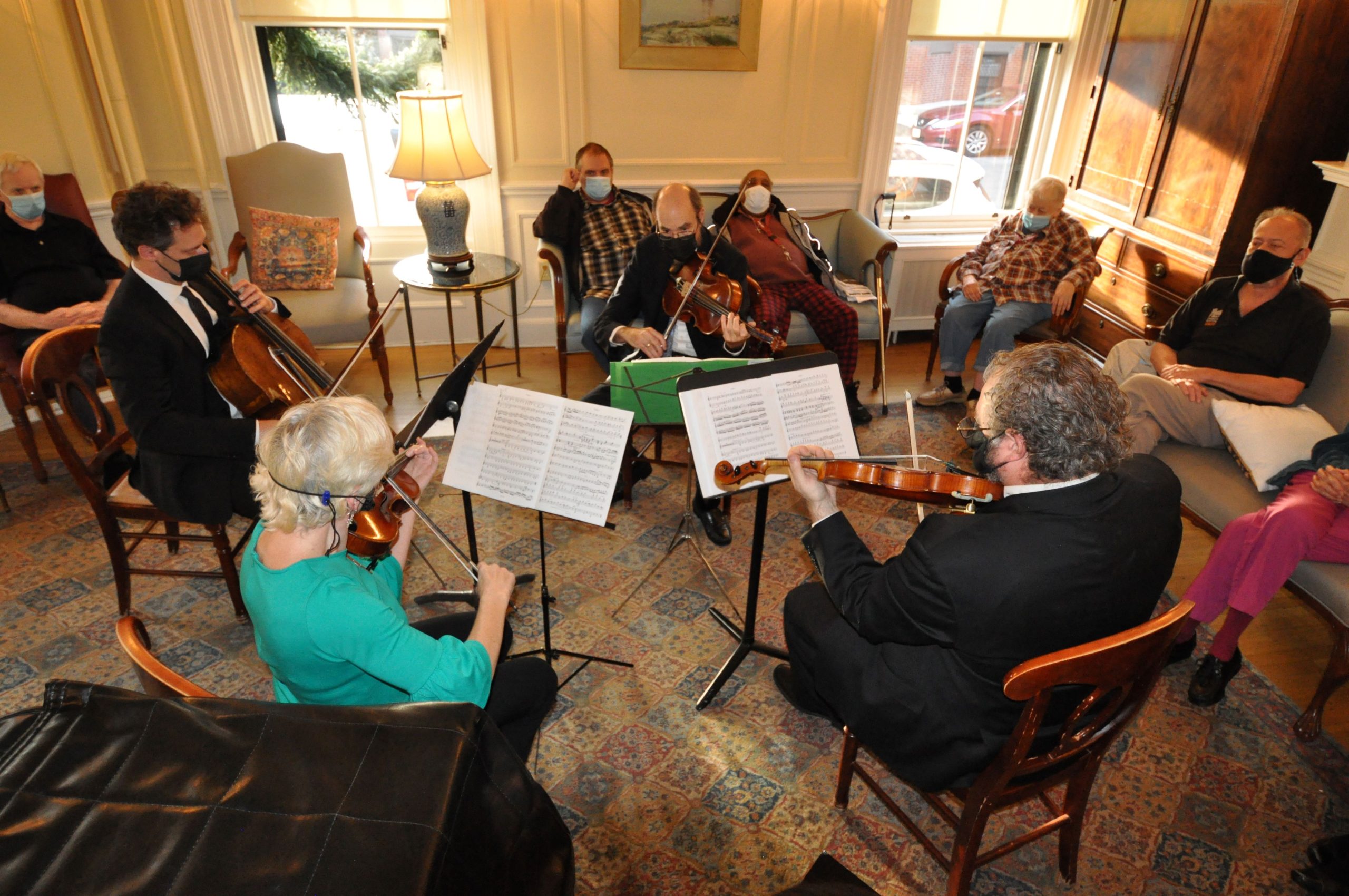 Members of Landmarks Orchestra's string quartet perform at a Music and Memory concert