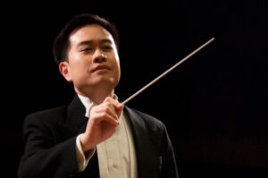 Headshot of Channing Yu conducting